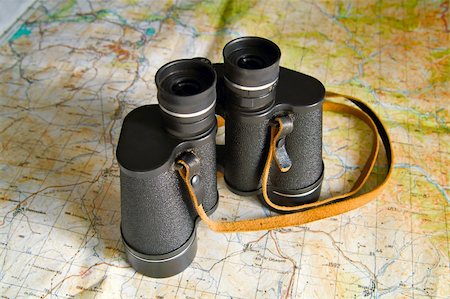 black binoculars on map Stock Photo - Budget Royalty-Free & Subscription, Code: 400-05008086