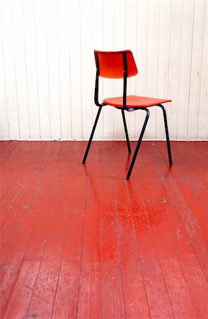 empty school chair - classic school chair on strong red coloured floor Stock Photo - Budget Royalty-Free & Subscription, Code: 400-05008199
