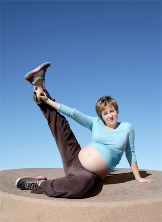 simsearch:400-08529613,k - A Pregnant young woman exercising outdoors Stock Photo - Budget Royalty-Free & Subscription, Code: 400-05008272