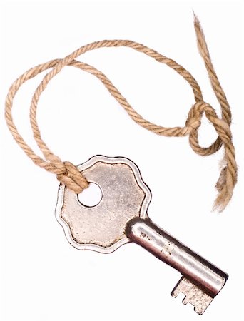 A vintage looking key isolated on a white background attached to a short string. Stockbilder - Microstock & Abonnement, Bildnummer: 400-05009297