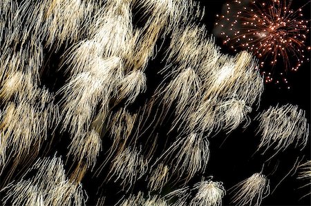 roman festival - Some holiday fireworks on the night sky Stock Photo - Budget Royalty-Free & Subscription, Code: 400-05009305