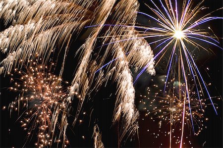 roman festival - Some holiday fireworks on the night sky Stock Photo - Budget Royalty-Free & Subscription, Code: 400-05009302