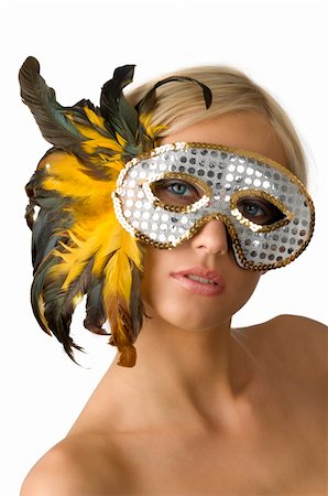 cute girl with shining silver mask and yellow feather Stock Photo - Budget Royalty-Free & Subscription, Code: 400-05009754