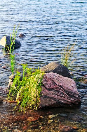 simsearch:400-05150811,k - Rocks in water at the shore of Georgian Bay, Canada. Awenda provincial park. Stock Photo - Budget Royalty-Free & Subscription, Code: 400-05000078