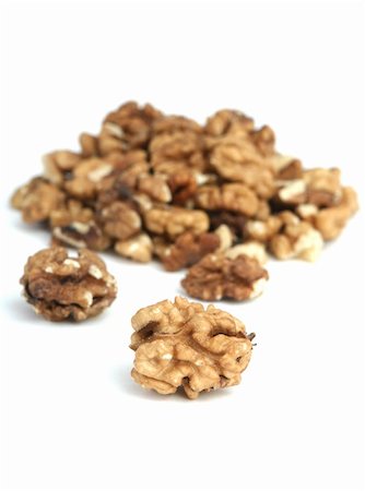 Heart made of nuts of almonds on a white background Stockbilder - Microstock & Abonnement, Bildnummer: 400-05000994