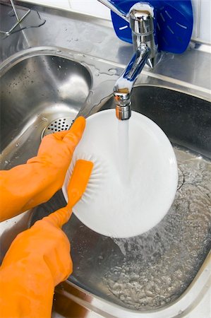 hands in gloves washing dishes at the kitchen Stock Photo - Budget Royalty-Free & Subscription, Code: 400-05001184