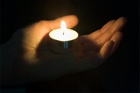 simsearch:640-01364849,k - Close-Up Of Candle In The Palm Of A Persons Hand Stock Photo - Budget Royalty-Free & Subscription, Code: 400-05001618