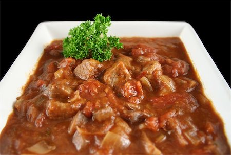 simsearch:400-04613511,k - Delicious beef and red wine casserole ready to serve. Fotografie stock - Microstock e Abbonamento, Codice: 400-05002828