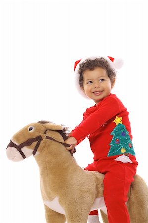 christmas child riding a pony Stock Photo - Budget Royalty-Free & Subscription, Code: 400-05003030