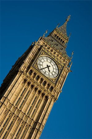 famous houses uk - Detail of clock face of Big Ben, London against blue sky Stock Photo - Budget Royalty-Free & Subscription, Code: 400-05003335