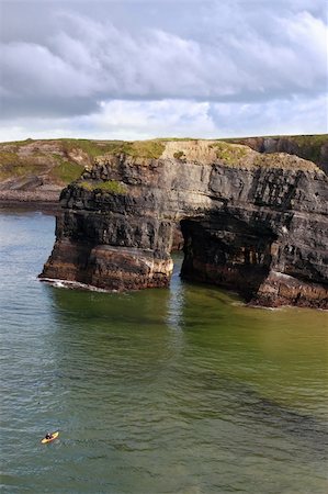 simsearch:400-05360154,k - a canoeist at the virgin rock in ballybunion ireland as seen from the cliffs Stock Photo - Budget Royalty-Free & Subscription, Code: 400-05003560