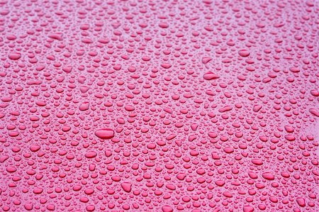a picture of water drops on a red metal surface Photographie de stock - Aubaine LD & Abonnement, Code: 400-05003597