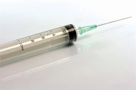 simsearch:400-08796662,k - syringe and needle closeup medical concepts Stock Photo - Budget Royalty-Free & Subscription, Code: 400-05014512
