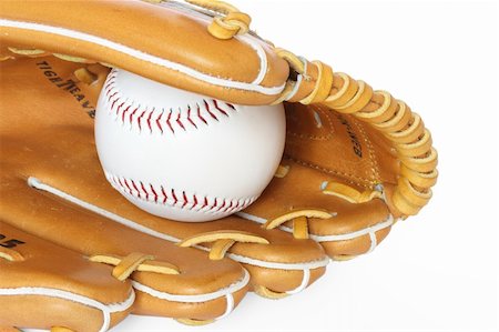 simsearch:622-02354223,k - Baseball catcher mitt with ball isolated on white background close up Stock Photo - Budget Royalty-Free & Subscription, Code: 400-05014602