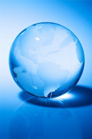 simsearch:400-03947973,k - Glass world globe in blue tone Photographie de stock - Aubaine LD & Abonnement, Code: 400-05015060
