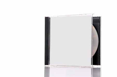 simsearch:400-03909479,k - a compact disc in the box, isolated on white background with reflection. Almost closed box Foto de stock - Super Valor sin royalties y Suscripción, Código: 400-05015138