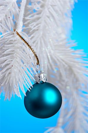 Blue Christmas Ornament hanging on a tree branch. Stock Photo - Budget Royalty-Free & Subscription, Code: 400-05015337