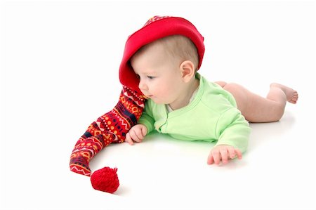 simsearch:400-05041038,k - a little baby in a large red hut portrait isolated on white Foto de stock - Super Valor sin royalties y Suscripción, Código: 400-05015424