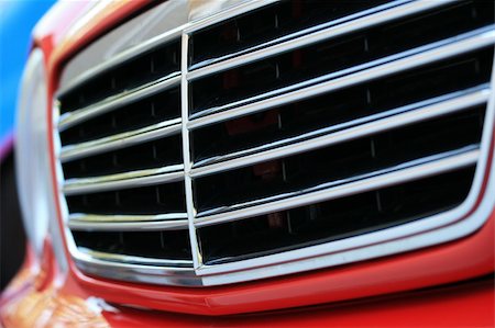 fast car close up - A close up of a red sports car grill Stock Photo - Budget Royalty-Free & Subscription, Code: 400-05015650
