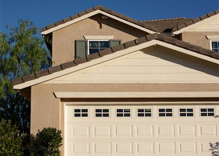 simsearch:400-05175746,k - Abstract of New Home Construction Facade. Fotografie stock - Microstock e Abbonamento, Codice: 400-05015729