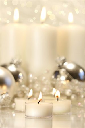 simsearch:400-05674130,k - White votive candles with tall candles in background Photographie de stock - Aubaine LD & Abonnement, Code: 400-05016035