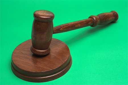 simsearch:400-08624071,k - judge's gavel,close up over green background Stock Photo - Budget Royalty-Free & Subscription, Code: 400-05016773