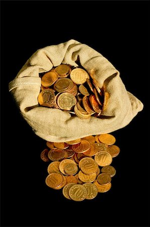 piles of cash pounds - Bunch of golden coins in money sack Stock Photo - Budget Royalty-Free & Subscription, Code: 400-05018466