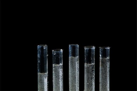 simsearch:400-03999005,k - chemistry tube with micro-drop isolated on black background Foto de stock - Super Valor sin royalties y Suscripción, Código: 400-05018549