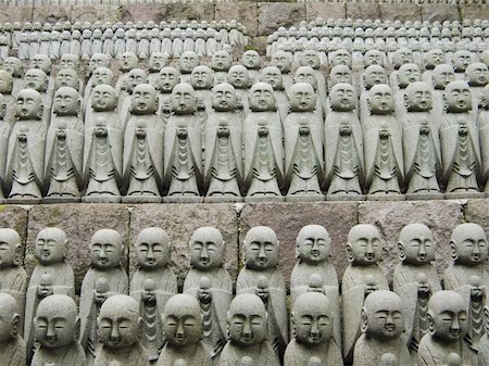 rows of similar japanese jizo sculptures in Hase-Dera temple, Kamakura, these jizo stay here for comfort of  unborn children Stock Photo - Budget Royalty-Free & Subscription, Code: 400-05018608