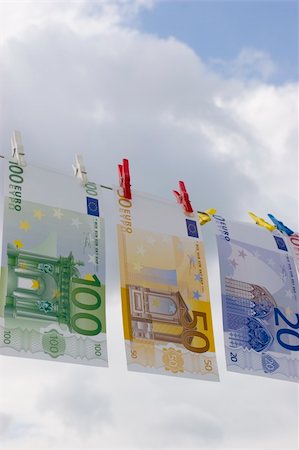 simsearch:693-06021294,k - European banknotes on a clothesline against cloudy sky Stock Photo - Budget Royalty-Free & Subscription, Code: 400-05018710