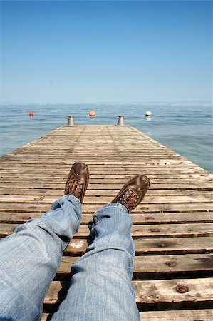 Old footbridge over blue ocean Foto de stock - Super Valor sin royalties y Suscripción, Código: 400-05019343