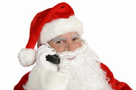 simsearch:400-05711921,k - A happy, smiling santa claus on the telephone.  Isolated on white. Stock Photo - Budget Royalty-Free & Subscription, Code: 400-05019513