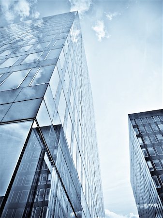 simsearch:400-04458373,k - Blue office building with clouds reflection Stock Photo - Budget Royalty-Free & Subscription, Code: 400-05010111