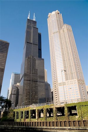 Neighboring skyscrapers, one dark and one bright colored Stock Photo - Budget Royalty-Free & Subscription, Code: 400-05010938