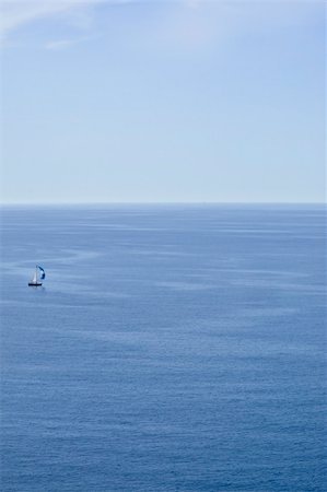 single boat on the sea Stock Photo - Budget Royalty-Free & Subscription, Code: 400-05010964