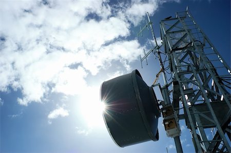 simsearch:400-04492786,k - Telecommunication tower in back-light against a cloudy blue sky Stock Photo - Budget Royalty-Free & Subscription, Code: 400-05011060