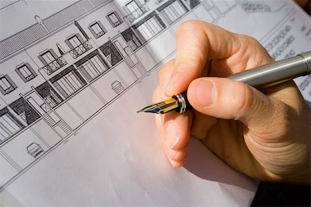 simsearch:400-04880387,k - a hand signing the architecture project of a house Stock Photo - Budget Royalty-Free & Subscription, Code: 400-05011252