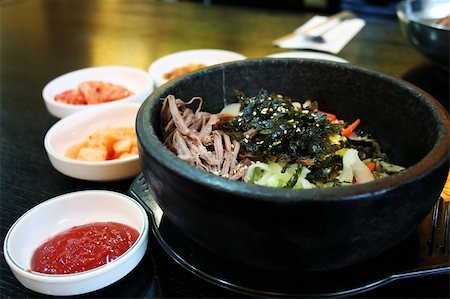 fornellino elettrico - Traditional Korean cusine bimbimbap dish of mixed rice Fotografie stock - Microstock e Abbonamento, Codice: 400-05012146