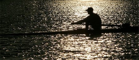 silhouette of man sculling - Rowing alone at sunset Stock Photo - Budget Royalty-Free & Subscription, Code: 400-05012222