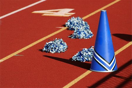 simsearch:400-04312909,k - Cheerleader pom poms and megaphone at a football game Stock Photo - Budget Royalty-Free & Subscription, Code: 400-05012288