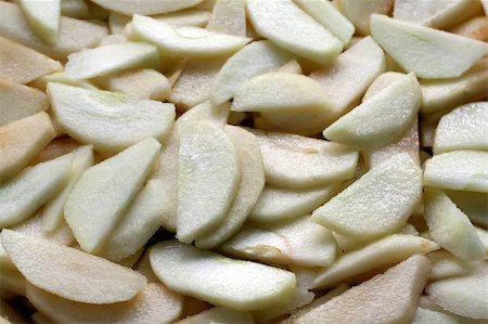 preparation of apple pie - Fresh sliced apples cooking ingredient filling for pie Stock Photo - Budget Royalty-Free & Subscription, Code: 400-05012449