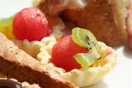 simsearch:400-05012252,k - Dessert fruit cups and pastries on white plate Stock Photo - Budget Royalty-Free & Subscription, Code: 400-05012469