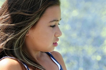 side girl hair wind - Profile of a beautiful teenage girl Stock Photo - Budget Royalty-Free & Subscription, Code: 400-05012594