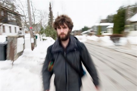 A motion blur abstract of a person walking in a hurry, a late rushing concept image. Stock Photo - Budget Royalty-Free & Subscription, Code: 400-05012952