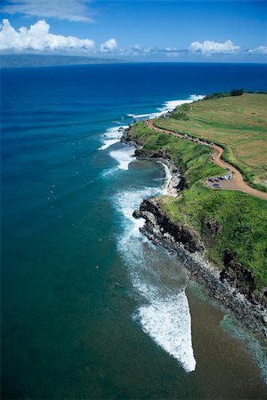 simsearch:700-01030239,k - Aerial view of cars parked on rocky cliff with surfers below in Maui, Hawaii. Stock Photo - Budget Royalty-Free & Subscription, Code: 400-05013406