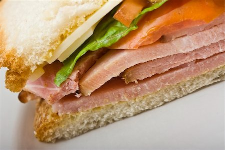 plate of cold cuts and cheeses - close up of a  ham and cheese sandwich Stock Photo - Budget Royalty-Free & Subscription, Code: 400-05013728