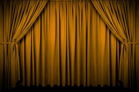 Large golden curtain with spot light and fading into dark. Foto de stock - Royalty-Free Super Valor e Assinatura, Número: 400-05013741