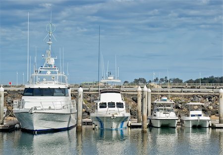 four boats in a marina in order of size Stock Photo - Budget Royalty-Free & Subscription, Code: 400-05013897