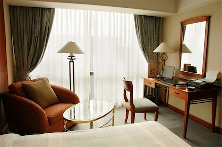 A warm and cosy room in a business hotel Fotografie stock - Microstock e Abbonamento, Codice: 400-05013911