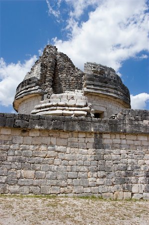 simsearch:400-04752077,k - Mayan heritage in Chichen Itza, - the wall of Observatory El Caracol (Fragment) on the blue sky, Yucatan, Mexico Stock Photo - Budget Royalty-Free & Subscription, Code: 400-05024772